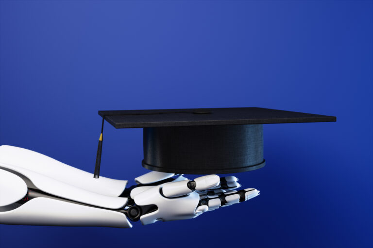 Side View Of Robot Hand Holding Graduation Cap